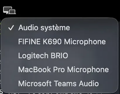 Le menu de la source audio s’ouvre, affichant l’Audio système en haut, suivi des microphones disponibles.