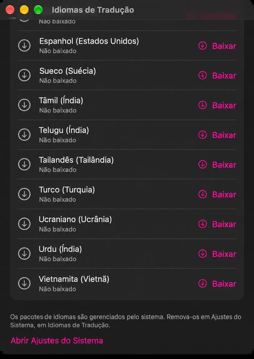 A janela Idiomas de Tradução rolou até as línguas que não estão instaladas, cada uma com um botão de Baixar, acima da nota do rodapé e do botão Abrir Configurações do Sistema