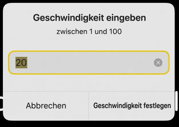 Das Dialogfeld „Eingabegeschwindigkeit“ mit einer Hinweisanzeige zwischen 1 und 100 und einem Button „Geschwindigkeit einstellen“