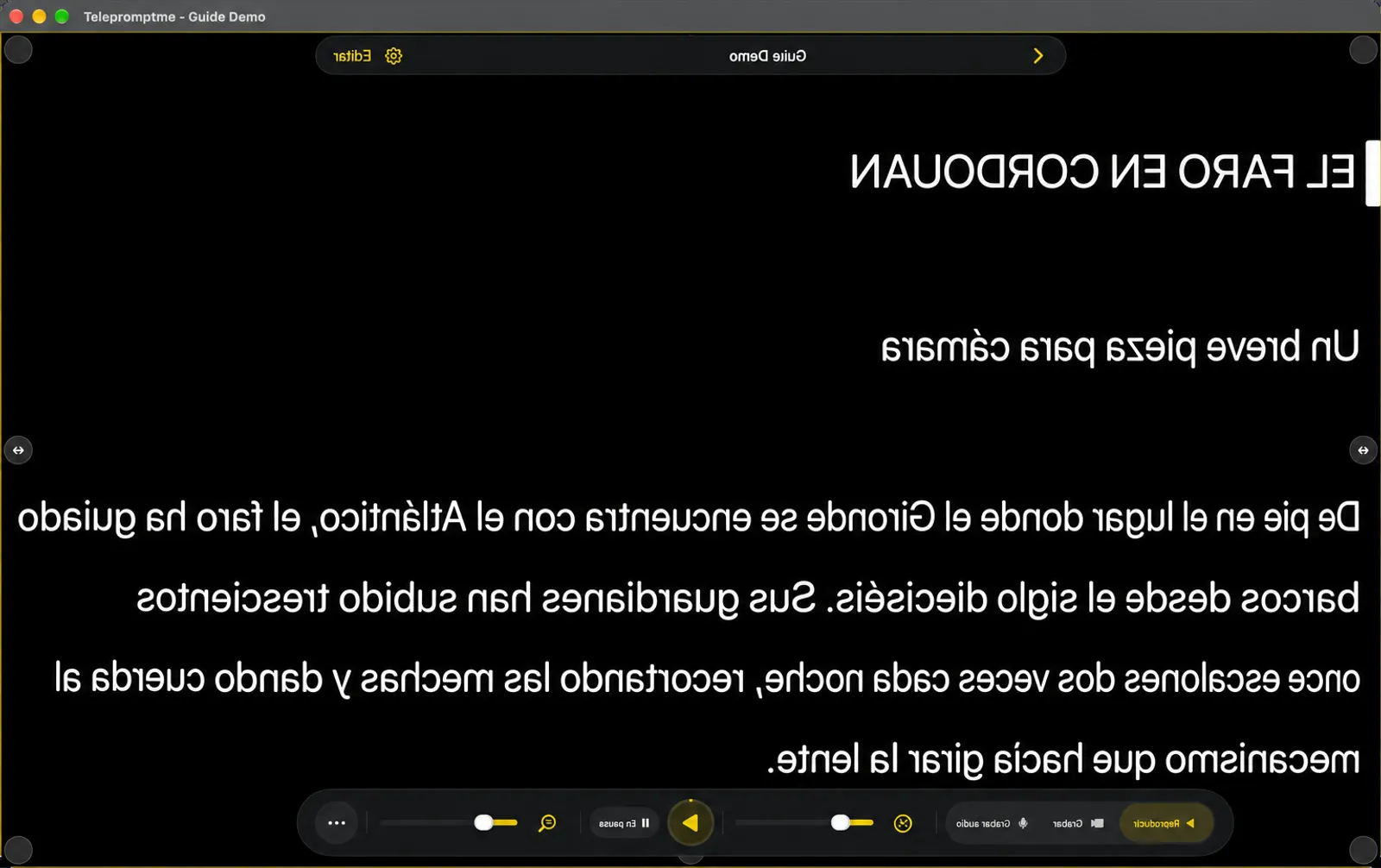 El telepromotor con el texto reflejado de izquierda a derecha, y el muelle y la pastilla de navegación reflejados con él.