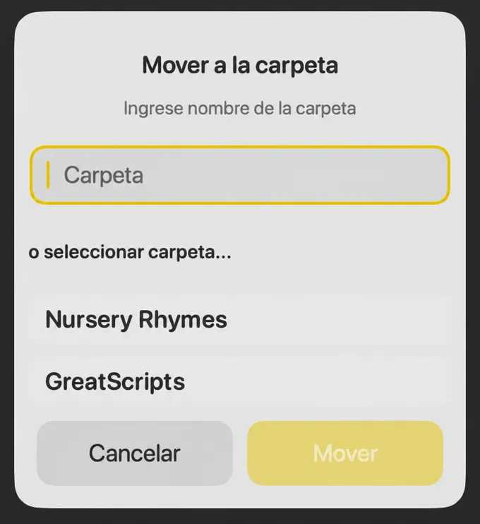 El diálogo Pasar a carpeta con un campo de nombre de carpeta y una lista de carpetas existentes